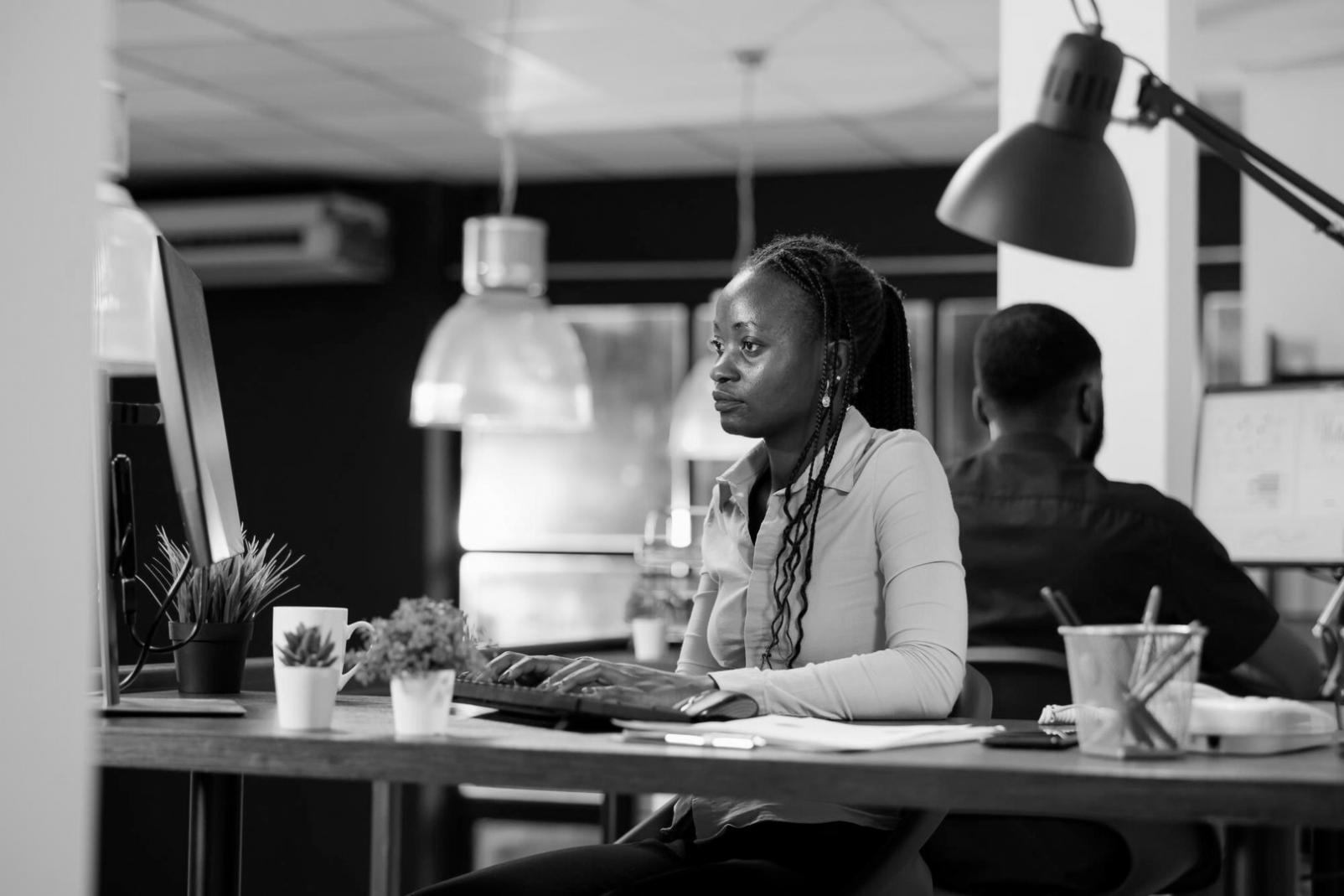 Family reviewing financial documents together at kitchen table