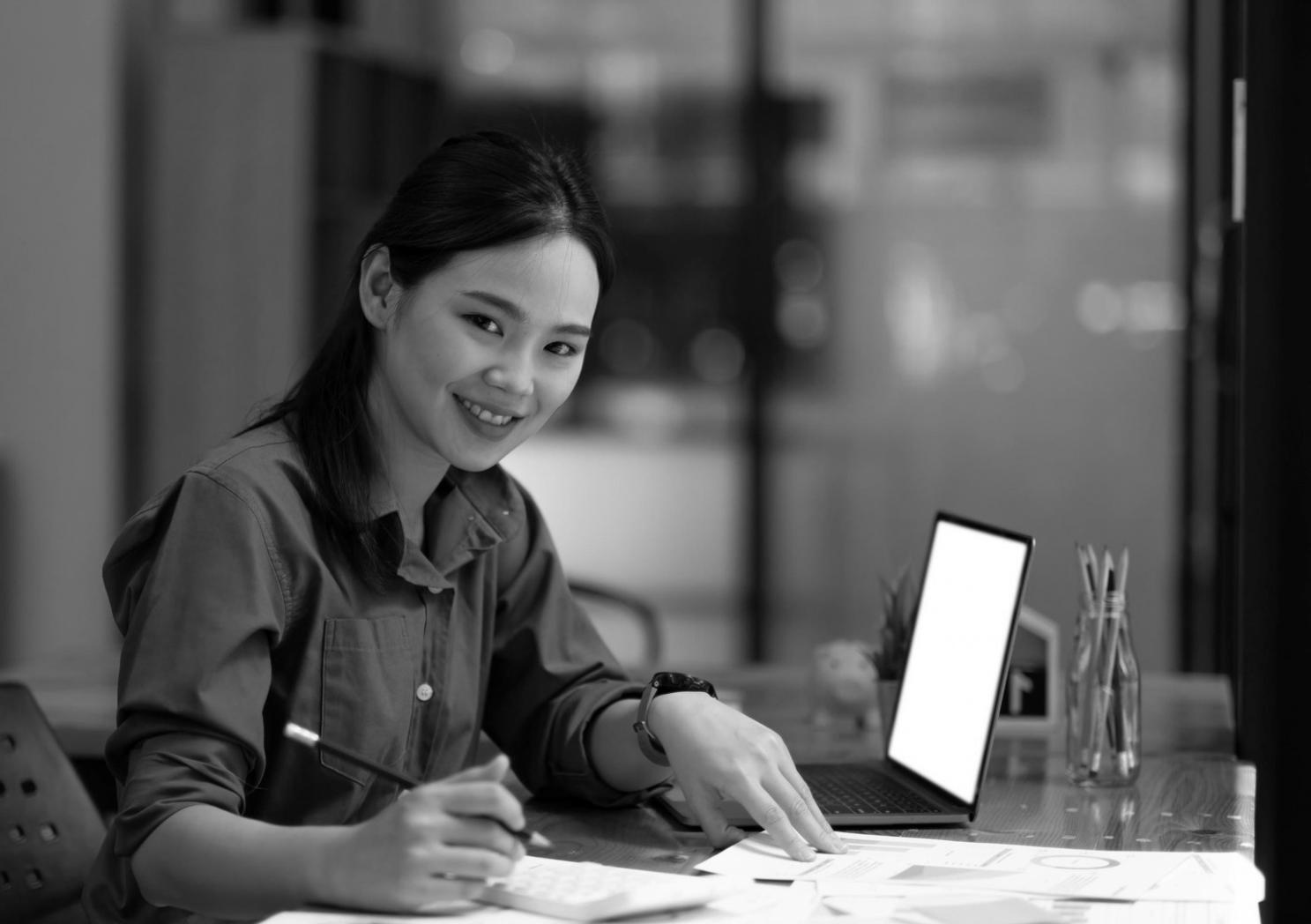 Person analyzing investment charts and market data